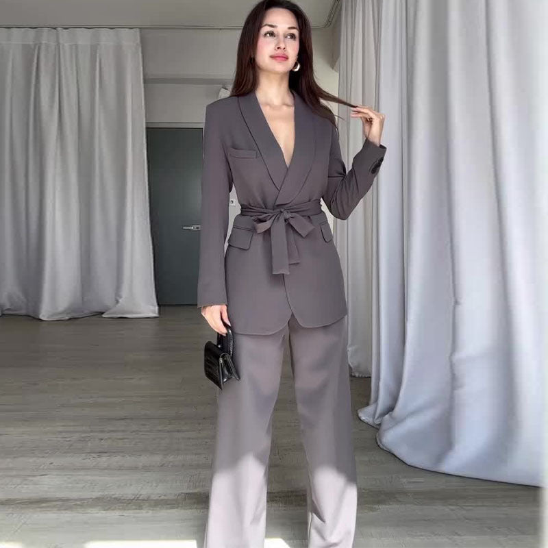 Damski Wiosenny Komplet Garniturowy z Wiązaną Marynarką i Szerokimi Spodniami z Wysokim Stanem